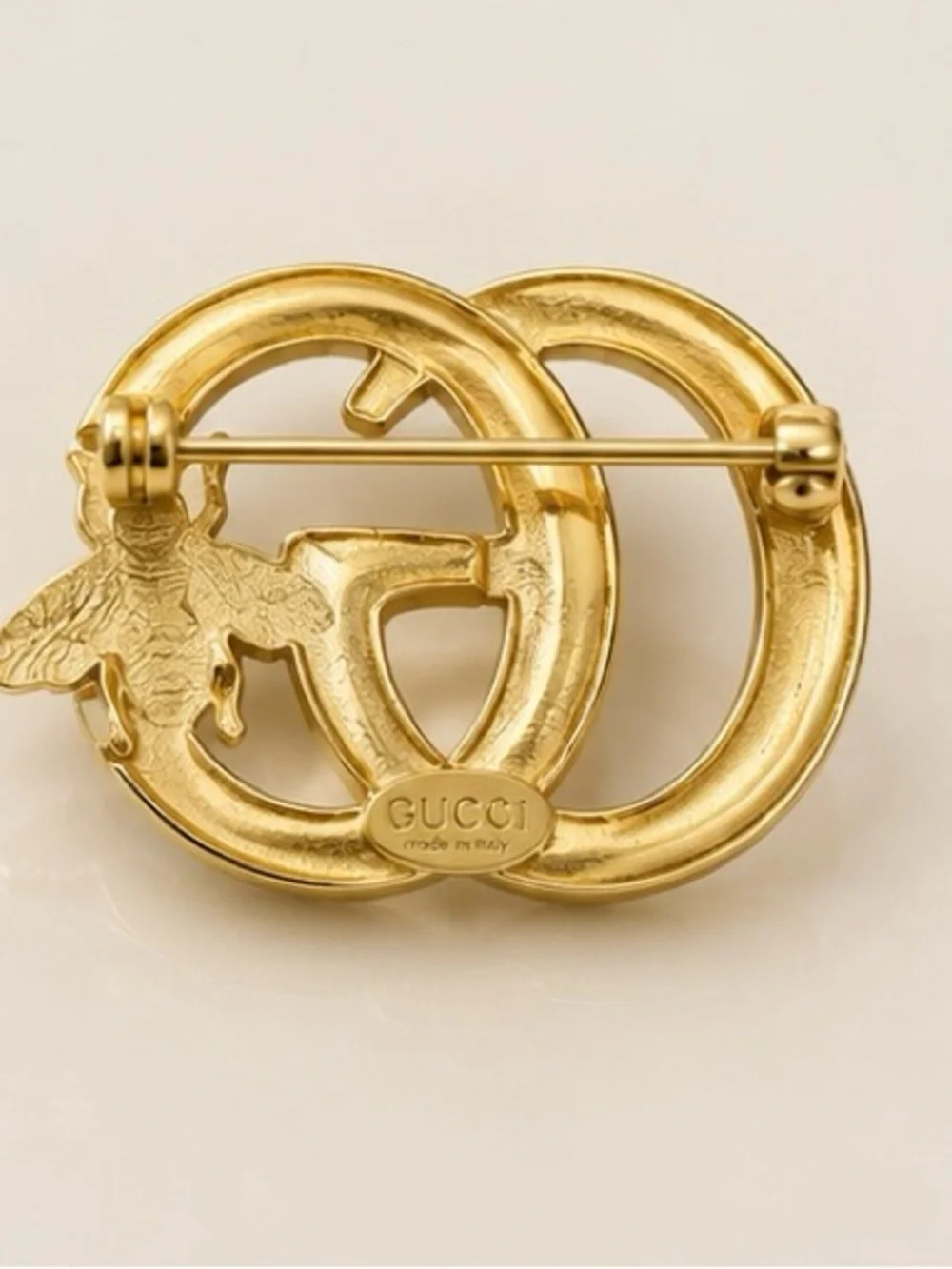 Gold Tone Bee Statement Brooch – Elegant Interlocking Fashion Pin